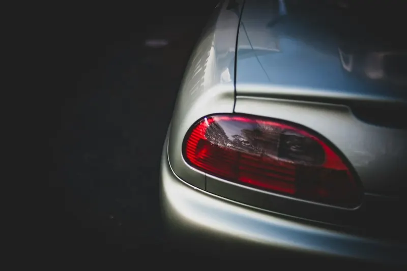 Close-up of a silver car's taillight